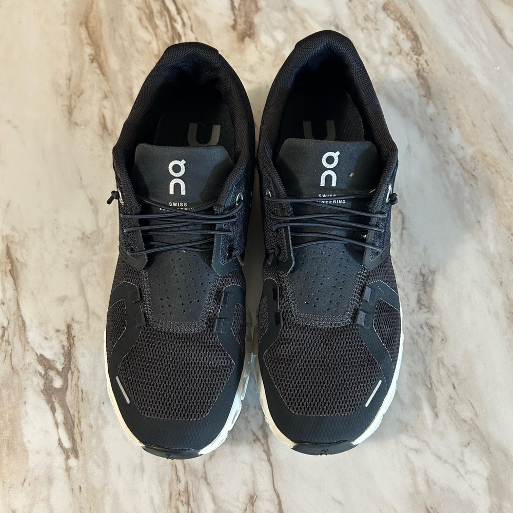 On Running Black Athletic Shoes with Cushioned Soles